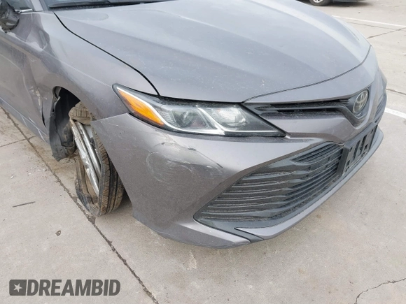 2019 Toyota Camry LE z VIN 4T1B11HK7KU759723, wystawiony jako IAAI lot #41679210 z przebiegiem 35 613 mil mil oraz . Historia ofert i sprzedaży dostępna na DreamBid. Obrazek 18.