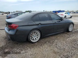 2014 BMW 3 Series 335i xDrive with VIN WBA3B9G53ENR92266, listed as a Copart auction lot 58800785 with 148,565 mi miles and Clean title. Bid and sale history available at DreamBid. Image 3.
