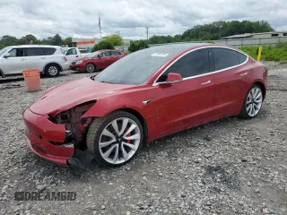 2018 Tesla Model 3 Long Range Battery z VIN 5YJ3E1EB3JF079911, wystawiony jako Copart lot #57480255 z przebiegiem 70 806 mil mil oraz Szkoda całkowita • Salvage title. Historia ofert i sprzedaży dostępna na DreamBid. Obrazek 1.