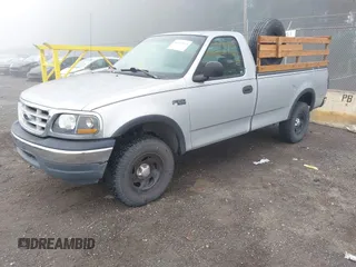 1999 Ford F-150 with VIN 2FTZF1828XCA85643, listed as a IAAI auction lot 41347113 with 173,813 mi miles and . Bid and sale history available at DreamBid. Image 17.