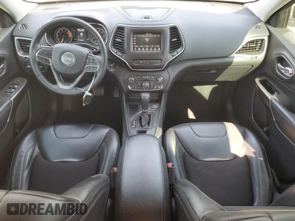 2019 Jeep Cherokee Latitude Plus with VIN 1C4PJLLX4KD248561, listed as a Copart auction lot 57296355 with 123,308 mi miles and Salvage title. Bid and sale history available at DreamBid. Image 8.