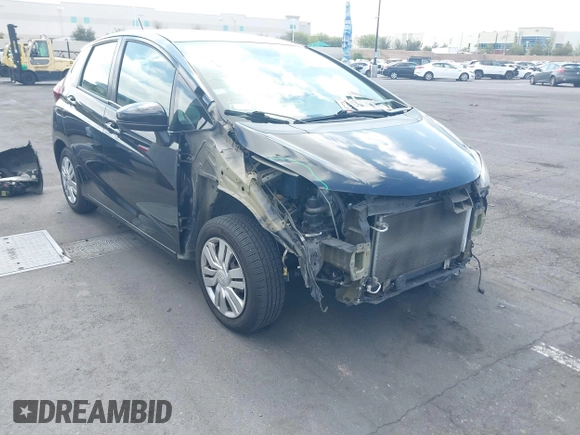 2015 Honda Fit LX z VIN 3HGGK5H52FM765921, wystawiony jako IAAI lot #42135740 z przebiegiem 82 647 mil mil oraz . Historia ofert i sprzedaży dostępna na DreamBid. Obrazek 1.