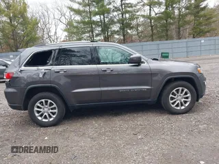 2021 Jeep Grand Cherokee Laredo X with VIN 1C4RJFAG6MC703691, listed as a IAAI auction lot 41655340 with 53,300 mi miles and . Bid and sale history available at DreamBid. Image 13.