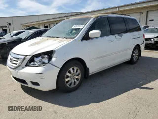 2010 Honda Odyssey EX-L with VIN 5FNRL3H77AB051869, listed as a Copart auction lot 48473815 with 248,511 mi miles and Salvage Title. Bid and sale history available at DreamBid. Image 1.
