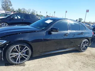 2021 BMW 3 Series M340i xDrive with VIN 3MW5U9J0XM8B49022, listed as a IAAI auction lot 41637152 with 65,452 mi miles. Bid and sale history available at carsss.com. Image 14.