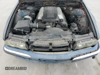 1996 BMW 7 Series 740iL z VIN WBAGJ8326TDL35670, wystawiony jako Copart lot #60806225 z przebiegiem 123 458 mil mil oraz Czysty tytuł • Clean title. Historia ofert i sprzedaży dostępna na DreamBid. Obrazek 11.