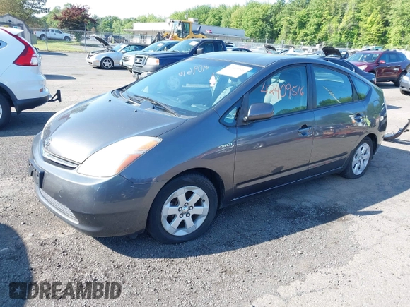 2007 Toyota Prius z VIN JTDKB20U473225645, wystawiony jako IAAI lot #42409516 z przebiegiem 154 050 mil mil oraz . Historia ofert i sprzedaży dostępna na DreamBid. Obrazek 2.