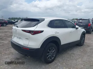 2021 Mazda CX-30 S with VIN 3MVDMAAL3MM228581, listed as a IAAI auction lot 42008198 with 44,132 mi miles and . Bid and sale history available at DreamBid. Image 4.
