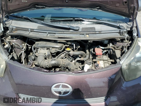 2013 Scion iQ with VIN JTNJJXB05DJ022305, listed as a Copart auction lot 58787155 with 136,046 mi miles and Salvage title. Bid and sale history available at DreamBid. Image 11.