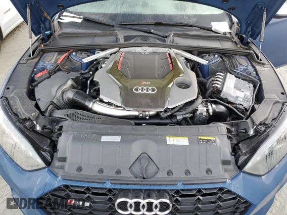 2021 Audi RS 5 Sportback z VIN WUAAWCF51MA901341, wystawiony jako Copart lot #76619034 z przebiegiem Nie podano mil oraz Szkoda całkowita • Salvage title. Historia ofert i sprzedaży dostępna na DreamBid. Obrazek 12.
