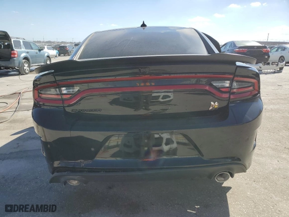 2022 Dodge Charger Scat Pack with VIN 2C3CDXGJXNH180037, listed as a Copart auction lot 77573324 with 15,583 mi miles and Salvage Title. Bid and sale history available at carsss.com. Image 6.