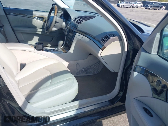 2003 Mercedes-Benz E-Class 3.2L with VIN WDBUF65J33A112308, listed as a IAAI auction lot 41871334 with 138,522 mi miles. Bid and sale history available at carsss.com. Image 5.