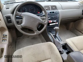 1998 Nissan Maxima GXE with VIN JN1CA21D1WT607137, listed as a Copart auction lot 43629285 with 159,196 mi miles and Salvage title. Bid and sale history available at DreamBid. Image 8.