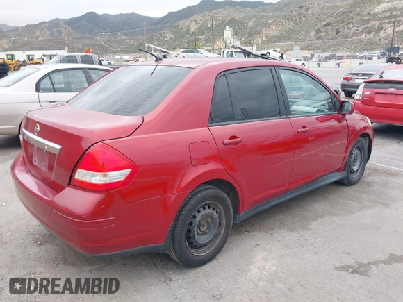 2009 Nissan Versa 1.8 S with VIN 3N1BC11E19L474039, listed as a IAAI auction lot 42045662 with 178,828 mi miles. Bid and sale history available at carsss.com. Image 4.