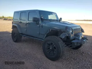 2014 Jeep Wrangler Unlimited Rubicon with VIN 1C4HJWFG9EL199501, listed as a Copart auction lot 61443595 with 86,940 mi miles and Salvage title. Bid and sale history available at DreamBid. Image 4.