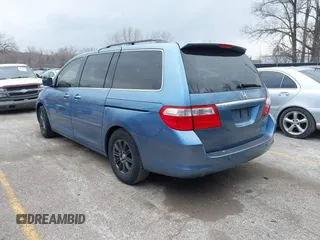 2005 Honda Odyssey TOURING with VIN 5FNRL38815B048075, listed as a IAAI auction lot 41813377 with 259,138 mi miles. Bid and sale history available at carsss.com. Image 3.