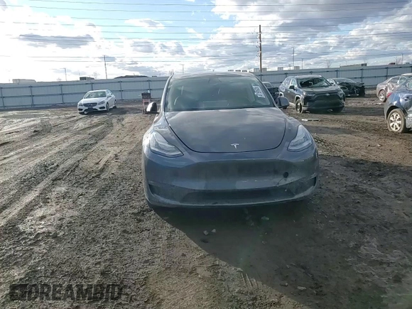 2022 Tesla Model Y Long Range with VIN 7SAYGDEE7NF386082, listed as a Copart auction lot 47191625 with 73,634 mi miles and Salvage Title. Bid and sale history available at carsss.com. Image 11.