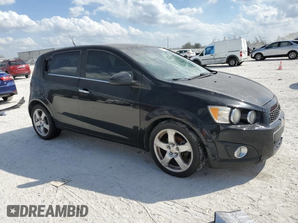 2012 Chevrolet Sonic LTZ z VIN 1G1JE6SH9C4130554, wystawiony jako Copart lot #45020925 z przebiegiem 152 038 mil mil oraz Czysty tytuł • Clean title. Historia ofert i sprzedaży dostępna na DreamBid. Obrazek 4.