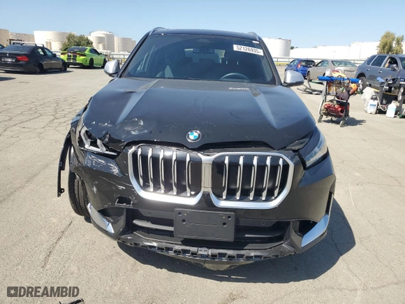 2024 BMW X1 xDrive28i with VIN WBX73EF09R5Z39211, listed as a Copart auction lot 52126935 with 4,581 mi miles and Salvage Title. Bid and sale history available at carsss.com. Image 5.