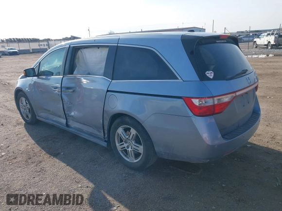 2011 Honda Odyssey Touring with VIN 5FNRL5H9XBB085626, listed as a IAAI auction lot 41890577 with 178,317 mi miles and . Bid and sale history available at DreamBid. Image 3.