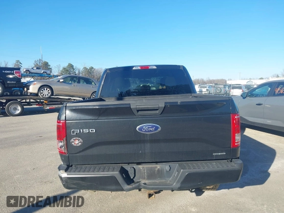 2015 Ford F-150 XLT with VIN 1FTEW1E86FFC00959, listed as a IAAI auction lot 41581711 with 130,298 mi miles. Bid and sale history available at carsss.com. Image 16.