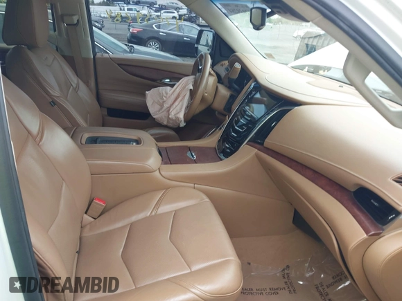 2016 Cadillac Escalade Platinum z VIN 1GYS4DKJ2GR316025, wystawiony jako IAAI lot #42039284 z przebiegiem Nie podano mil oraz . Historia ofert i sprzedaży dostępna na DreamBid. Obrazek 5.