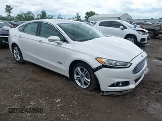 2016 Ford Fusion Titanium with VIN 3FA6P0SU5GR287017, listed as a IAAI auction lot 42316622 with 97,000 mi miles and . Bid and sale history available at DreamBid. Image 1.