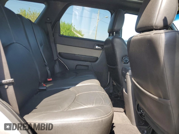 2009 Mercury Mariner Premier z VIN 4M2CU87769KJ11358, wystawiony jako Copart lot #55577235 z przebiegiem 206 627 mil mil oraz Szkody całkowita. Historia ofert i sprzedaży dostępna na DreamBid. Obrazek 11.