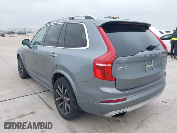 2016 Volvo XC90 T6 Momentum with VIN YV4A22PKXG1021392, listed as a IAAI auction lot 41413673 with 144,761 mi miles. Bid and sale history available at carsss.com. Image 3.