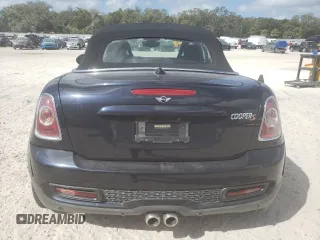 2012 MINI Roadster S z VIN WMWSY3C52CT144319, wystawiony jako Copart lot #78349654 z przebiegiem Nie podano mil oraz Szkoda całkowita • Salvage title. Historia ofert i sprzedaży dostępna na DreamBid. Obrazek 6.
