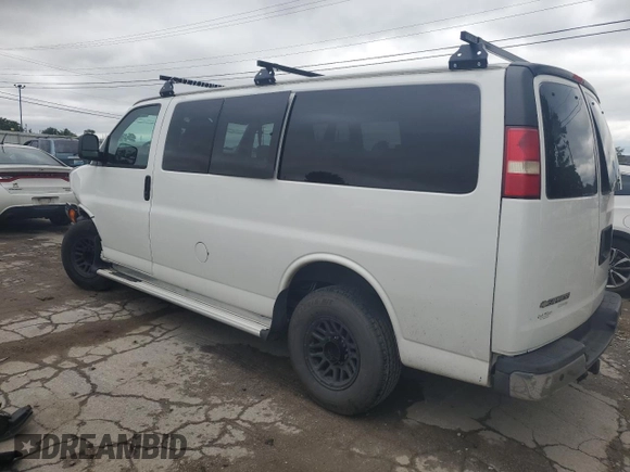 2014 Chevrolet Express Passenger 1LT with VIN 1GAZGYFG9E1207695, listed as a Copart auction lot 62146754 with 108,836 mi miles and Salvage title. Bid and sale history available at DreamBid. Image 2.