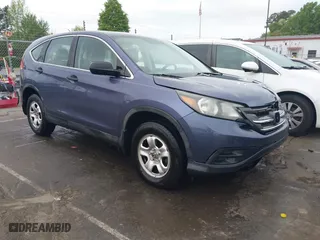 2014 Honda CR-V LX with VIN 3CZRM3H39EG703959, listed as a IAAI auction lot 41990964 with 87,424 mi miles. Bid and sale history available at carsss.com. Image 1.