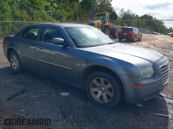 2007 Chrysler 300 with VIN 2C3LA43R07H860986, listed as a IAAI auction lot 42162490 with 117,334 mi miles. Bid and sale history available at carsss.com. Image 1.
