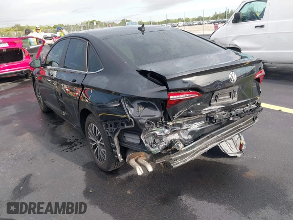 2019 Volkswagen Jetta SEL z VIN 3VWEB7BU2KM273950, wystawiony jako IAAI lot #42414034 z przebiegiem 84 100 mil mil oraz . Historia ofert i sprzedaży dostępna na DreamBid. Obrazek 6.