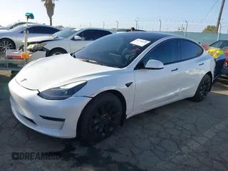 2023 Tesla Model 3 with VIN 5YJ3E1EA0PF503352, listed as a IAAI auction lot 41718658 with 28,426 mi miles and . Bid and sale history available at DreamBid. Image 2.