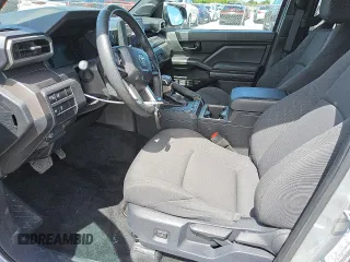 2024 Toyota Tacoma SR5 with VIN 3TMKB5FN8RM002169, listed as a Copart auction lot 60308275 with 5,789 mi miles and Clean title. Bid and sale history available at DreamBid. Image 7.