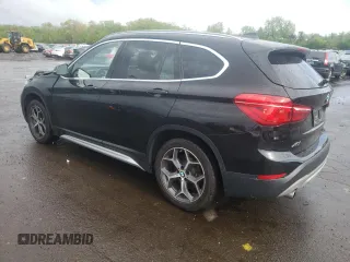 2018 BMW X1 xDrive28i with VIN WBXHT3C35J3H30946, listed as a Copart auction lot 55927505 with 69,626 mi miles and Salvage title. Bid and sale history available at DreamBid. Image 2.