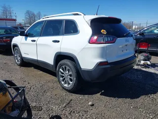 2021 Jeep Cherokee Altitude with VIN 1C4PJLLBXMD164087, listed as a IAAI auction lot 41694113 with 76,352 mi miles. Bid and sale history available at carsss.com. Image 3.