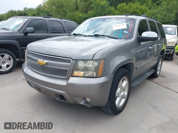 2007 Chevrolet Tahoe LTZ with VIN 1GNFC13J37J399493, listed as a IAAI auction lot 42656195 with 231,950 mi miles and . Bid and sale history available at DreamBid. Image 2.