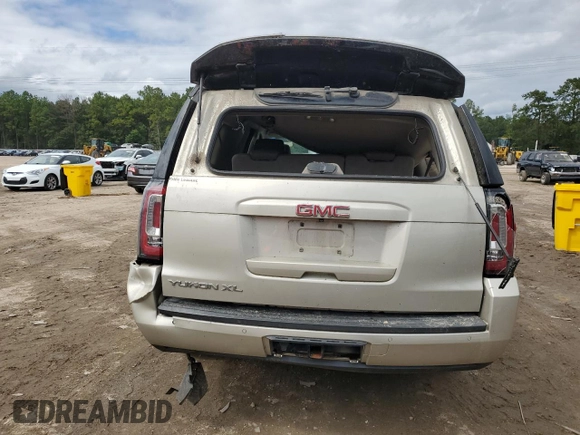 2015 GMC Yukon XL SLT with VIN 1GKS1HKC5FR168608, listed as a Copart auction lot 71564384 with 197,538 mi miles and Salvage Title. Bid and sale history available at carsss.com. Image 6.