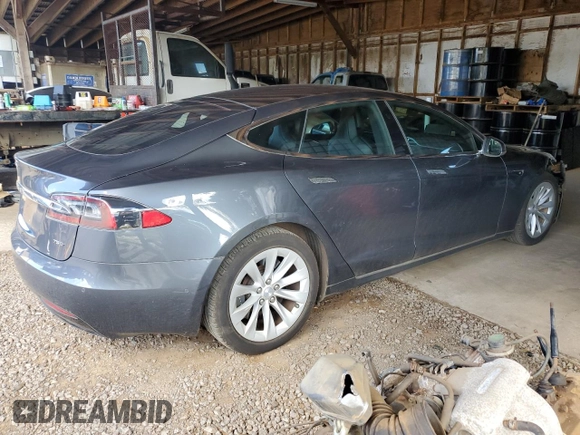 2017 Tesla Model S 100D with VIN 5YJSA1E20HF198419, listed as a Copart auction lot 61481605 with 52,853 mi miles and Salvage title. Bid and sale history available at DreamBid. Image 3.