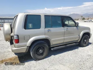 2002 Isuzu Trooper S z VIN JACDS58X527J08603, wystawiony jako Copart lot #63357674 z przebiegiem 218 282 mil mil oraz Szkody całkowita. Historia ofert i sprzedaży dostępna na DreamBid. Obrazek 3.