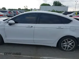 2016 Ford Fusion SE z VIN 3FA6P0H78GR200177, wystawiony jako IAAI lot #41785542 z przebiegiem Nie podano mil oraz . Historia ofert i sprzedaży dostępna na DreamBid. Obrazek 13.