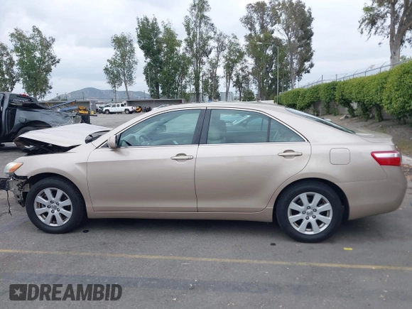 2009 Toyota Camry with VIN 4T4BE46K19R092530, listed as a IAAI auction lot 42051158 with 135,875 mi miles. Bid and sale history available at carsss.com. Image 15.