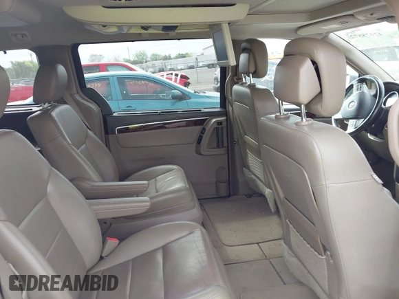 2011 Volkswagen Routan z VIN 2V4RW6DG6BR695681, wystawiony jako IAAI lot #42078872 z przebiegiem 141 730 mil mil oraz . Historia ofert i sprzedaży dostępna na DreamBid. Obrazek 8.