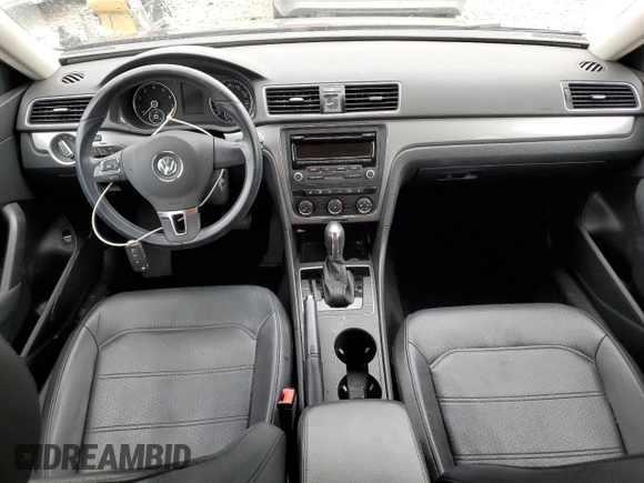 2014 Volkswagen Passat Wolfsburg Edition with VIN 1VWAS7A30EC028920, listed as a Copart auction lot 57174285 with 129,797 mi miles and Salvage title. Bid and sale history available at DreamBid. Image 8.