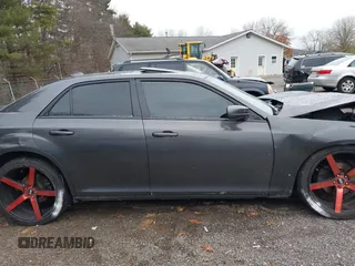 2016 Chrysler 300 S with VIN 2C3CCABG9GH230229, listed as a IAAI auction lot 40937329 with 147,808 mi miles and . Bid and sale history available at DreamBid. Image 14.