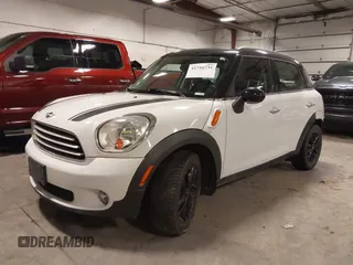 2014 MINI Countryman with VIN WMWZB3C57EWR42476, listed as a IAAI auction lot 41716731 with 94,378 mi miles and . Bid and sale history available at DreamBid. Image 2.