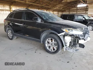 2015 Mazda CX-9 Touring с VIN JM3TB2CV1F0457586, выставлен на аукционе Copart как лот 63646475 с пробегом 125 509 миль миль и Чистый • Clean title. История ставок и продаж доступна на DreamBid. Изображение 4.