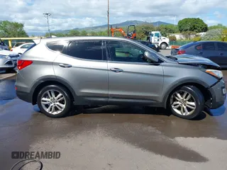 2013 Hyundai Santa Fe Sport z VIN 5XYZWDLA9DG064393, wystawiony jako IAAI lot #41601453 z przebiegiem 71 136 mil mil oraz . Historia ofert i sprzedaży dostępna na DreamBid. Obrazek 13.